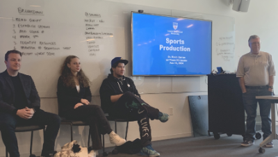 Kevin Curran and students discussing sports production